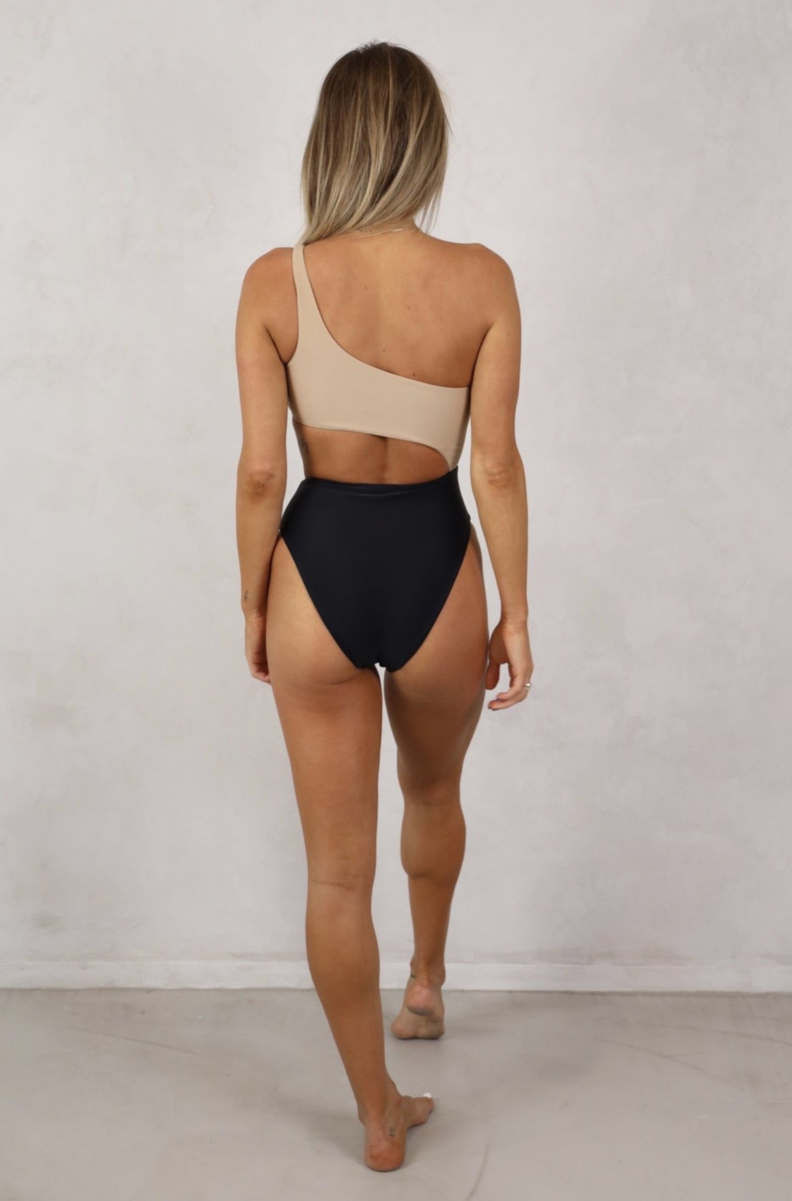 Kendall and kylie on sale black one piece swimsuit