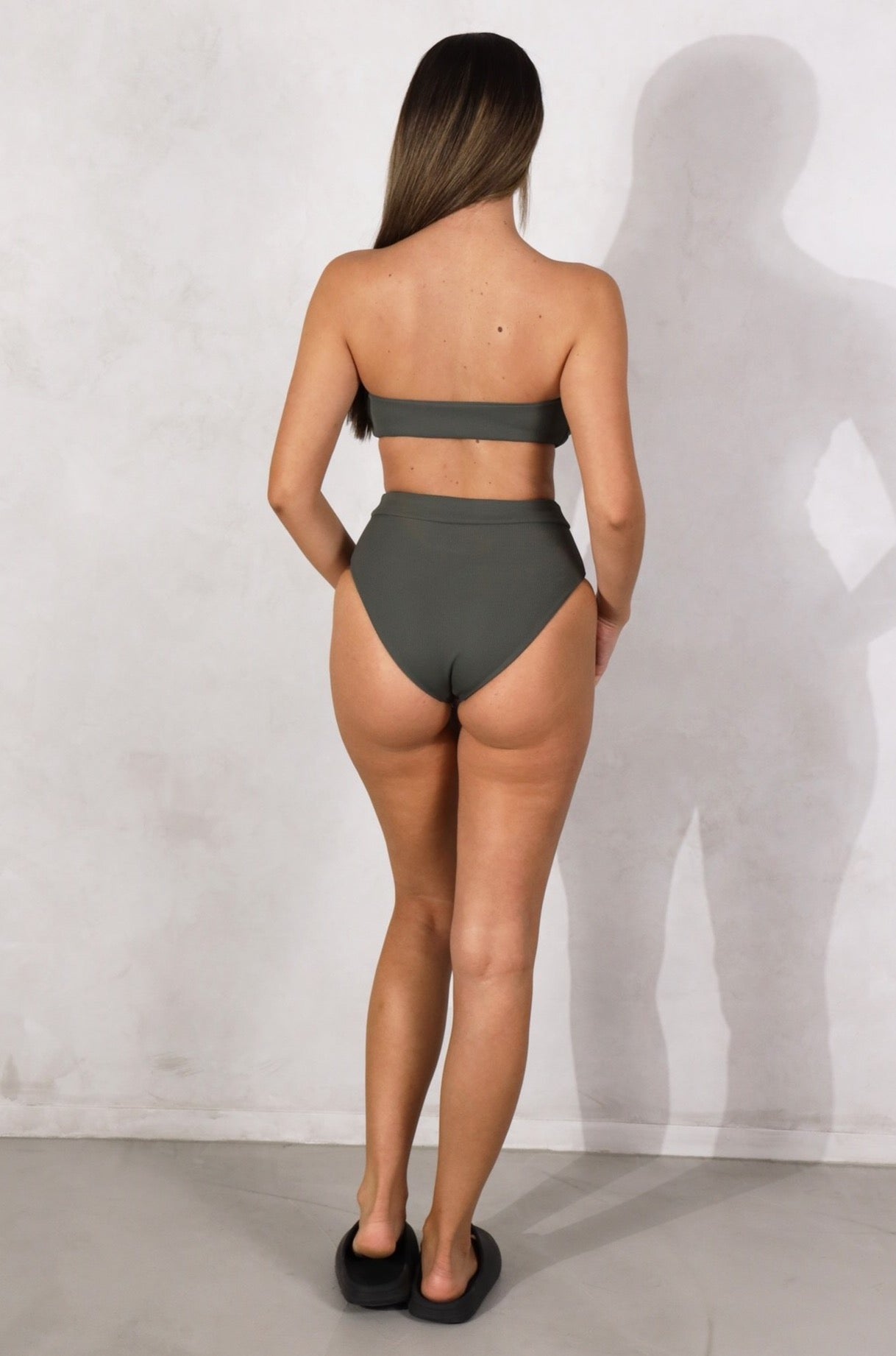 Our beautiful ribbed swim wear are known for their elegant look as well as their function. Mix and Match your Alessia set with any colour of your choice. Shop Australian Swimwear online. Enjoy Free Shipping on us. Free Shipping on any Australian Order over $100. Free Shipping to New Zealand on orders over $180. Alessia Bottom Olive High Waist Seamless Stitching Full Coverage. Fabric: Ribbed / Easy to care / Stretchy / 87% Nylon / 13% Spandex