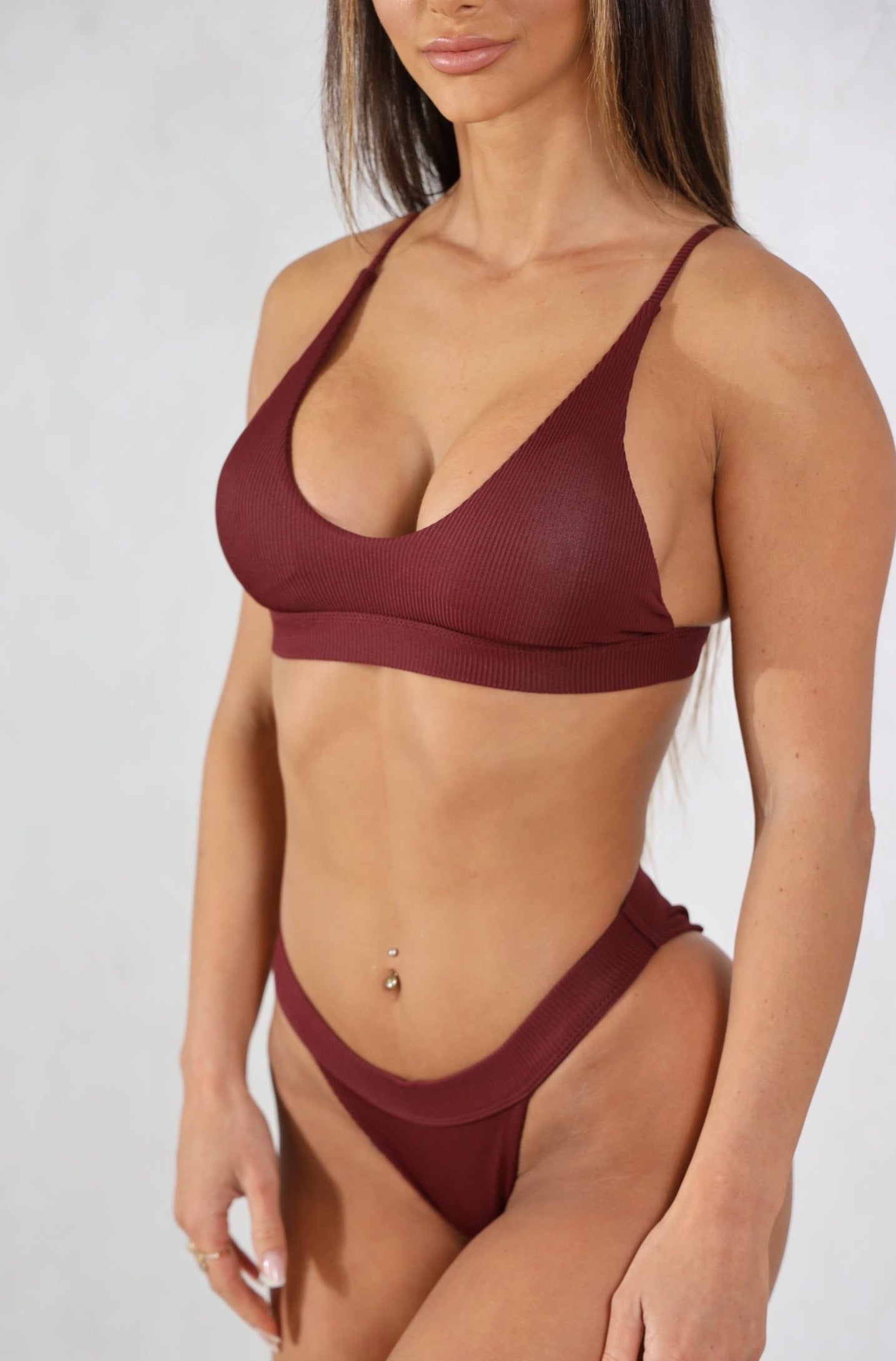 The Ariana burgundy ribbed two piece bikini set are known for their durability and function with adjustable straps,removable padding and a secure back clasp attachment. Shop Women's Swimwear. Women's Bikinis and swimsuits. Ribbed Swimwear. Free Shipping on Australian Orders over $100. Free Shipping to New Zealand on orders over $180. Afterpay Available. Shipping Worldwide.