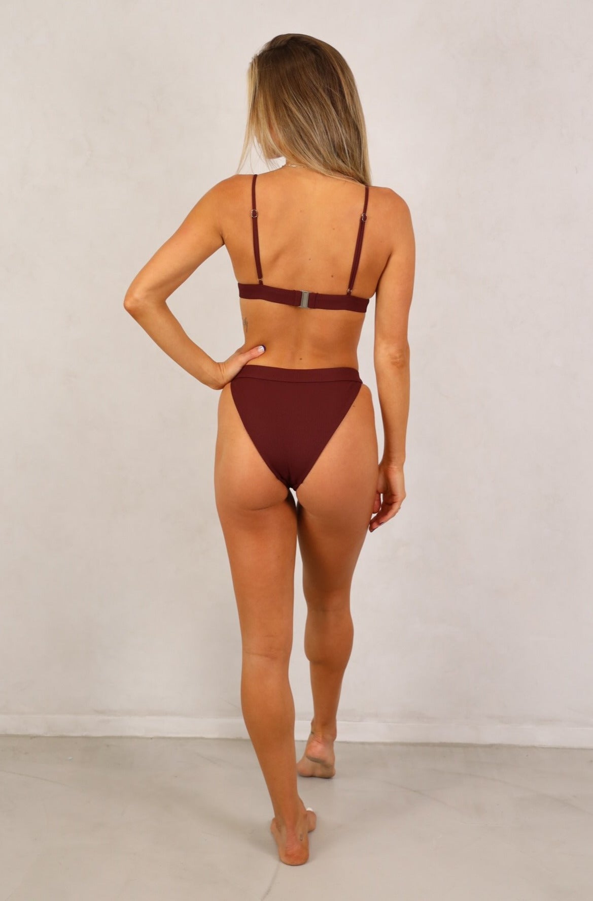 The Ariana burgundy ribbed two piece bikini set are known for their durability and function with adjustable straps,removable padding and a secure back clasp attachment. Shop Women's Swimwear. Women's Bikinis and swimsuits. Ribbed Swimwear. Free Shipping on Australian Orders over $100. Free Shipping to New Zealand on orders over $180. Afterpay Available. Shipping Worldwide.