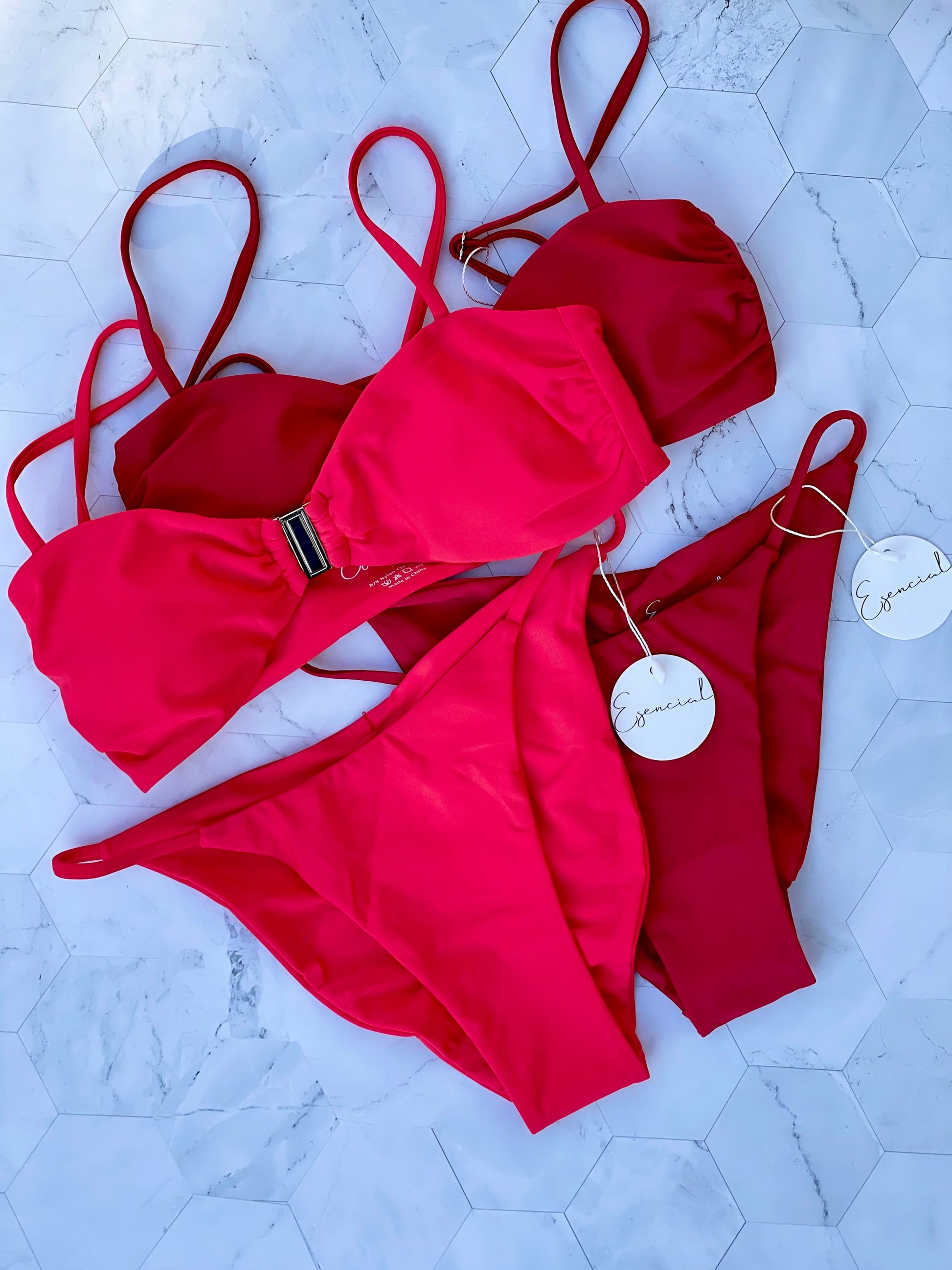 Shop Esencial Swim cheeky brazilian minimal tan line bikini sets. Spaghetti adjustable straps with removable padding and front clasp secure attachment. Shop Coral Women's Swimwear. Coral bikini sets and swimsuits.Matching seamless Brazilian bikini bottoms available with cheeky coverage. Women's Swimwear. Coral bikini tops. Coral swimsuits.Free Shipping on Australian Orders over $100.